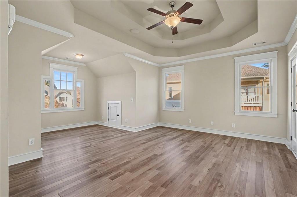 3105 Brick Lane Decatur, GA 30033 - Photo 41 of 72 wooden floor in an empty room with a window