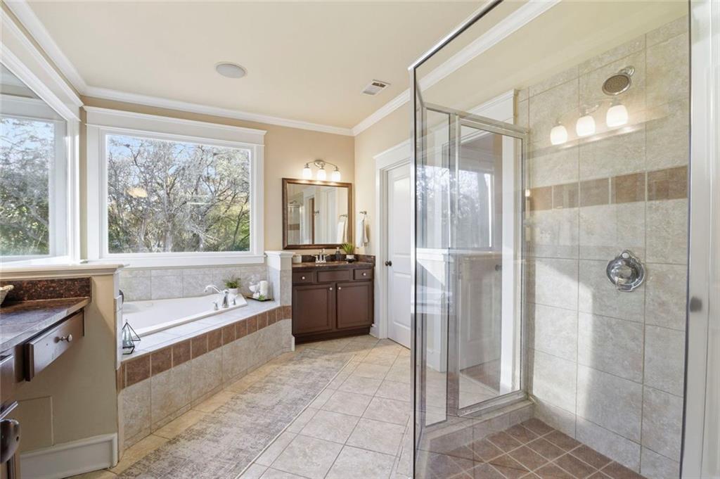 3105 Brick Lane Decatur, GA 30033 - Photo 48 of 72 a bathroom with a tub shower and sink