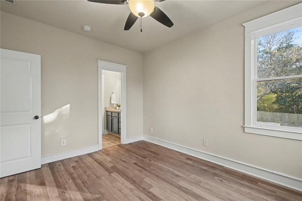 3105 Brick Lane Decatur, GA 30033 - Photo 57 of 72 a view of empty room with wooden floor and fan