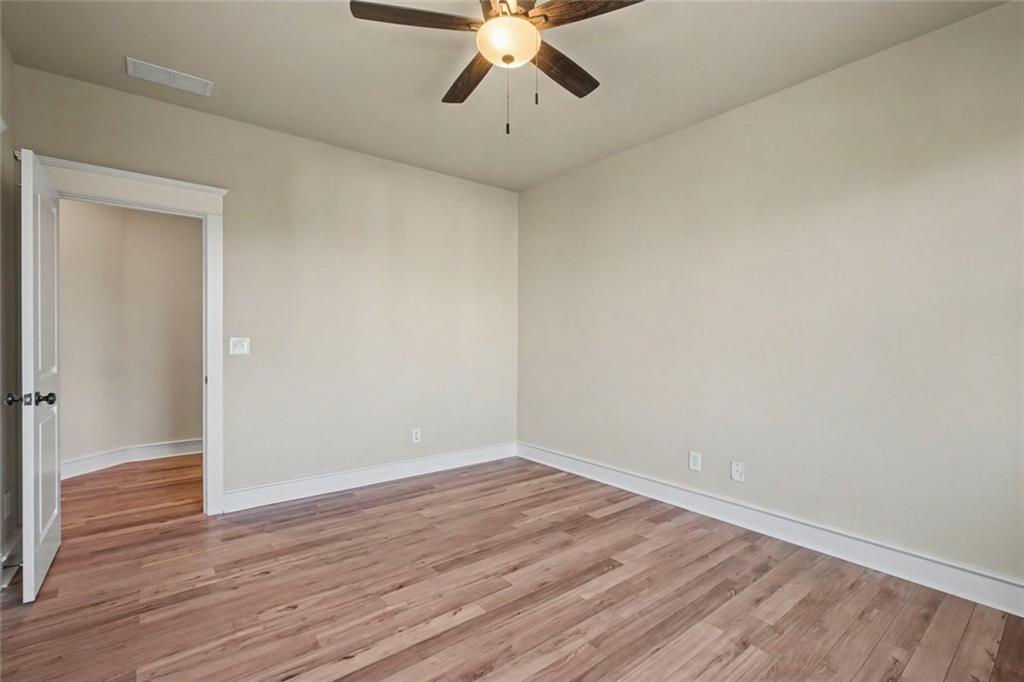 3105 Brick Lane Decatur, GA 30033 - Photo 61 of 72 a view of an empty room with wooden floor