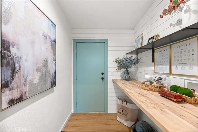 a room with a sink and a mirror