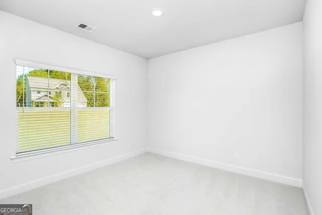 an empty room with a window