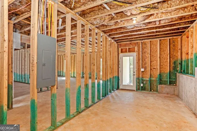 a view of a room with wooden walls