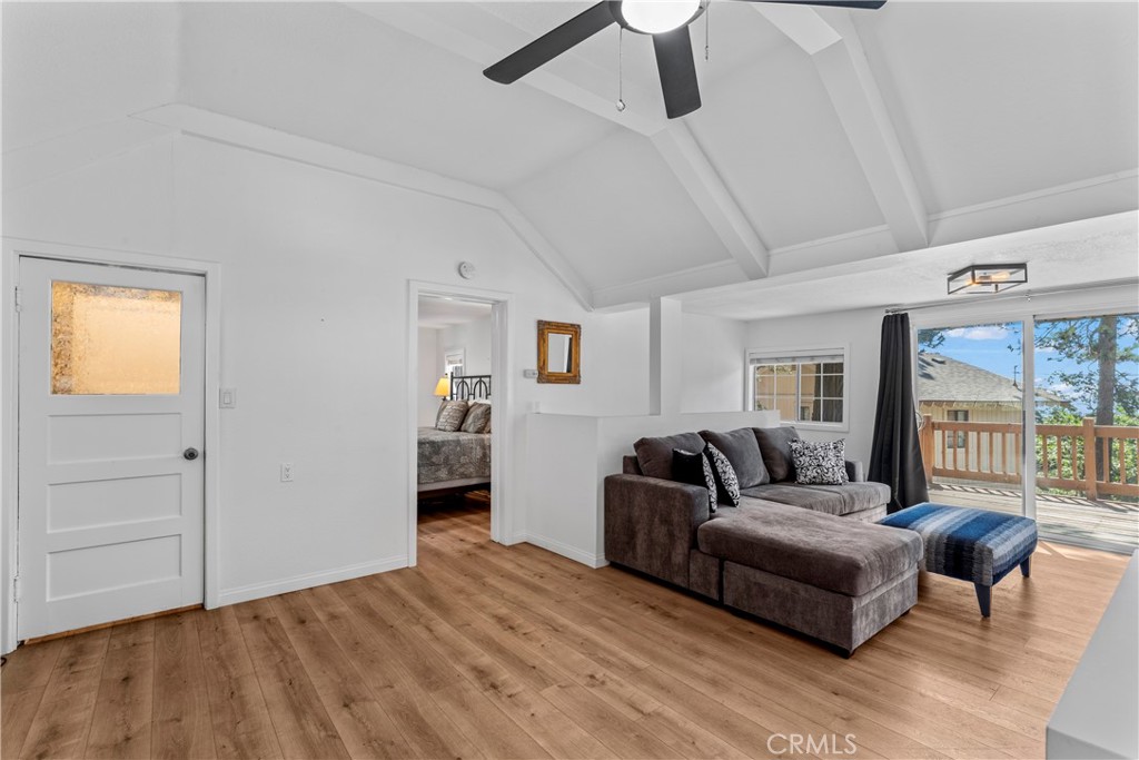 1139 Bear Springs Road Twin Peaks, CA 92391 - Photo 14 of 45 a living room with furniture and a wooden floor