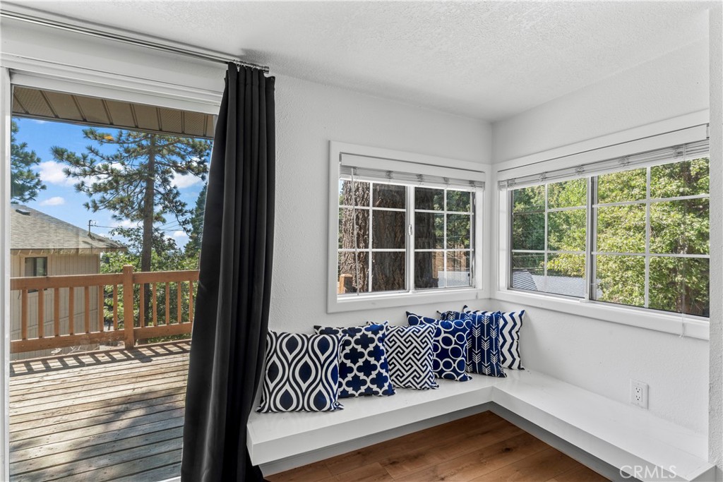 1139 Bear Springs Road Twin Peaks, CA 92391 - Photo 24 of 45 a view of a porch with a bench