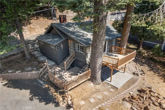 a view of a chair and table in the balcony
