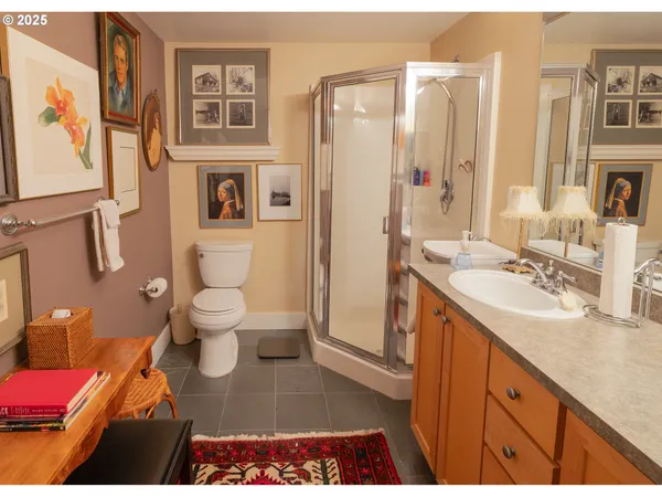 a bathroom with a tub and shower