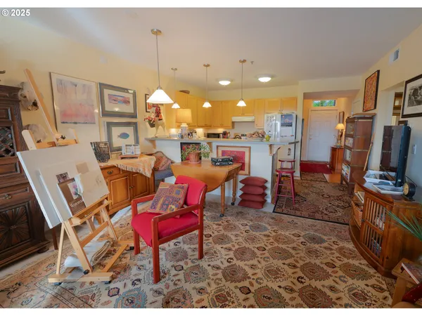 a living room with lots of furniture and a flat screen tv