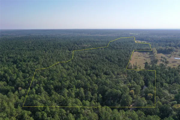 an aerial view of house with outdoor space