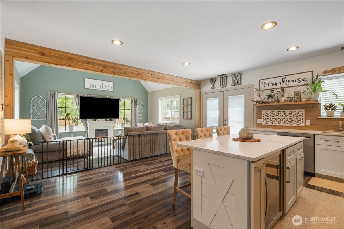 26709 Entwhistle Road East Buckley, WA 98321 - Photo 11 of 40 a view of a kitchen with cabinets table and chairs