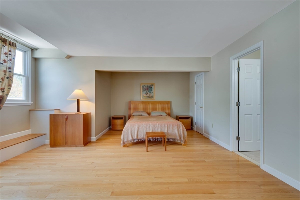 75 Page Road, Unit 16 Bedford, MA 01730 - Photo 11 of 27 a bedroom with a bed and window
