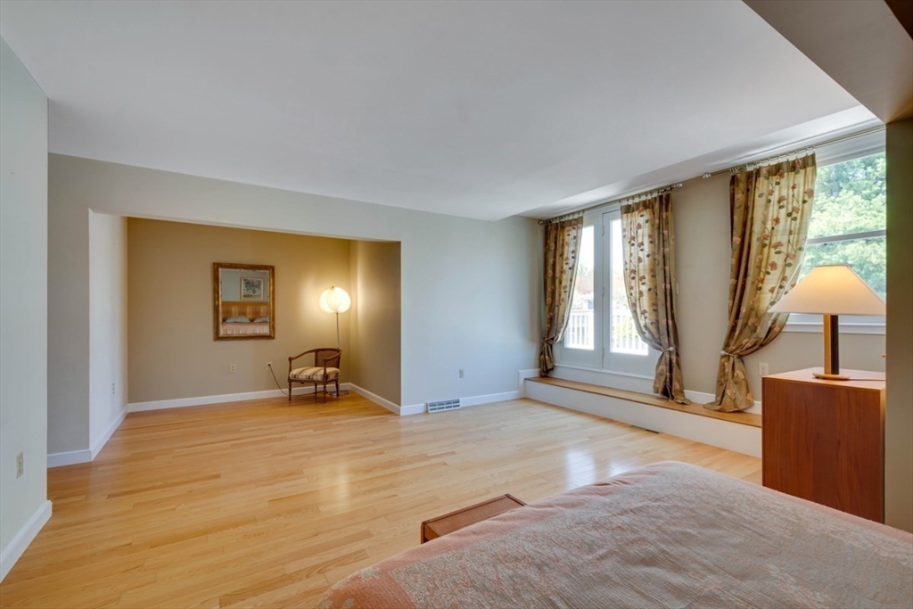 75 Page Road, Unit 16 Bedford, MA 01730 - Photo 15 of 27 a view of a livingroom with a staircase