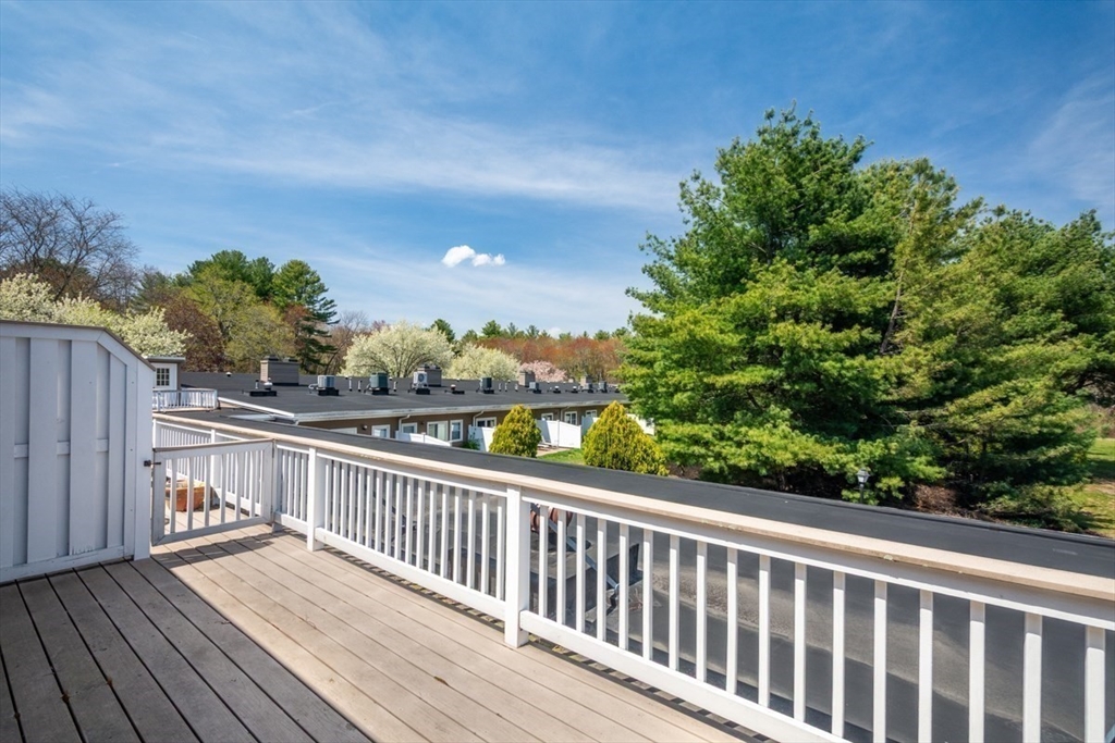 75 Page Road, Unit 16 Bedford, MA 01730 - Photo 21 of 27 a view of city from a balcony
