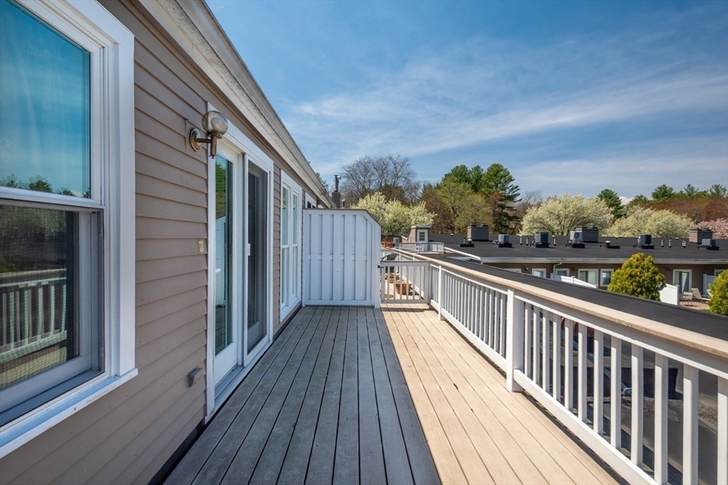75 Page Road, Unit 16 Bedford, MA 01730 - Photo 22 of 27 a view of balcony with wooden floor