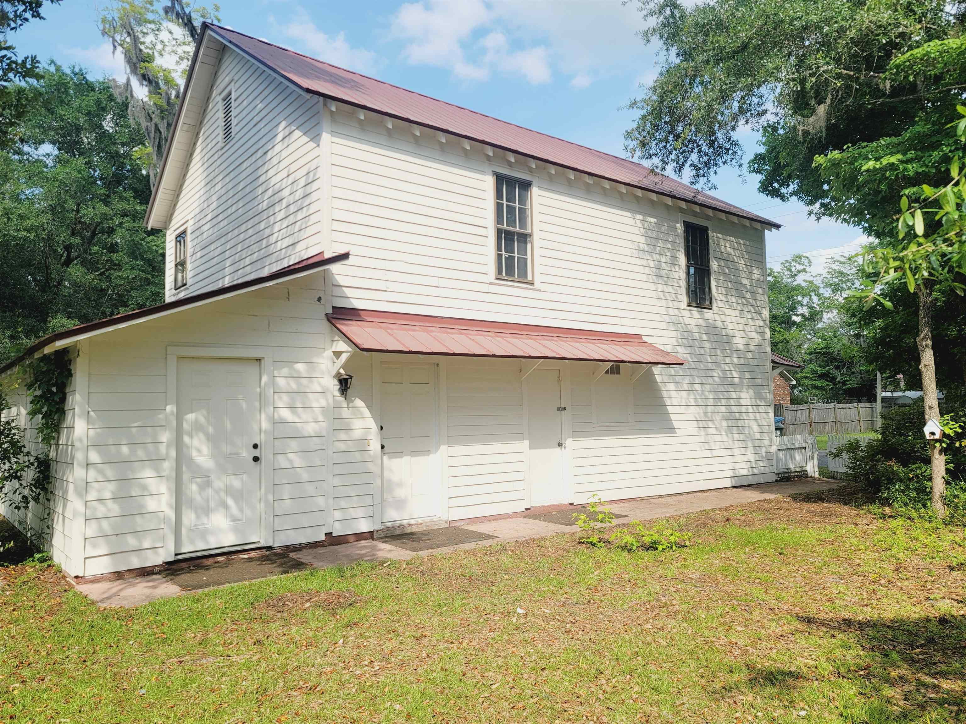 302 Jefferson Street, Unit B Springfield, GA 31329 - Photo 1 of 24 a view of a house with a yard