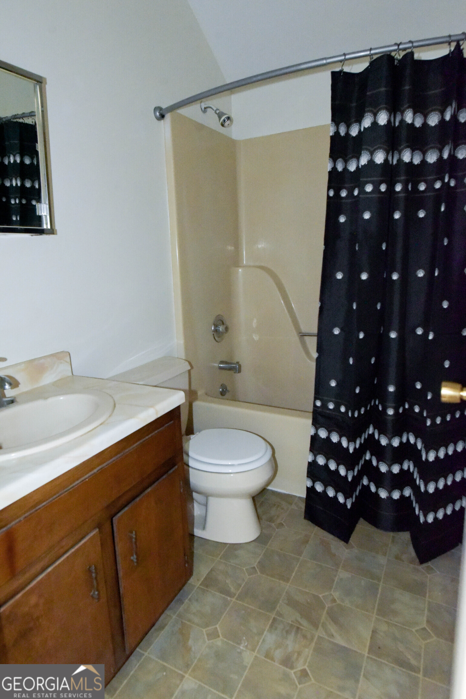 302 Jefferson Street, Unit B Springfield, GA 31329 - Photo 15 of 24 a bathroom with a sink a toilet and shower