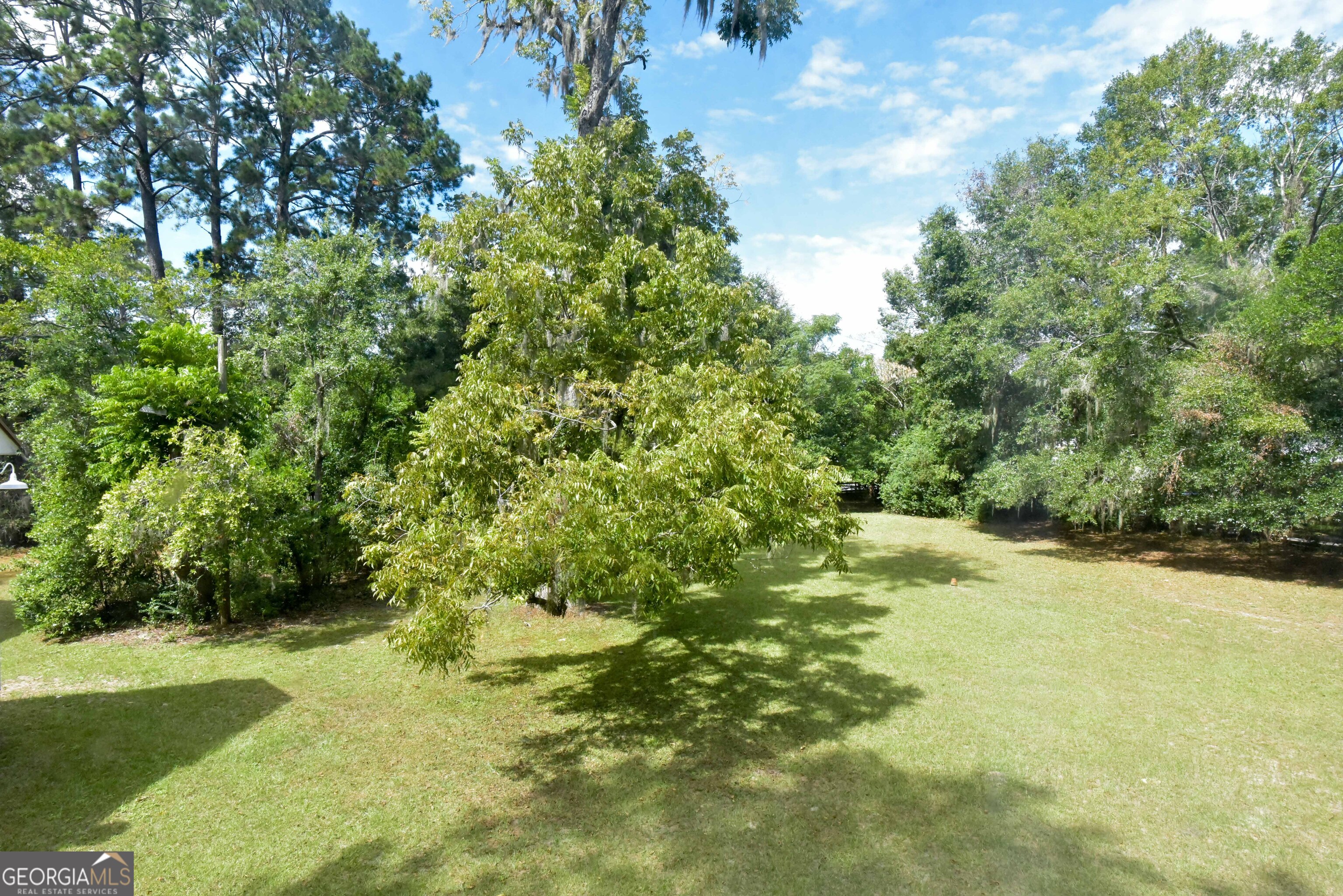 302 Jefferson Street, Unit B Springfield, GA 31329 - Photo 23 of 24 a view of yard with green space