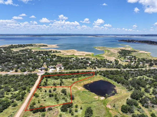 a view of a lake from a yard