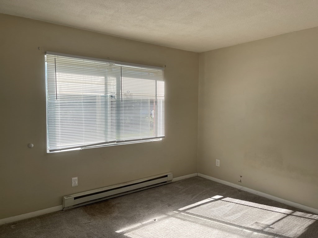 5 Turnpike Road, Unit 229 Townsend, MA 01469 - Photo 10 of 13 an empty room with a window