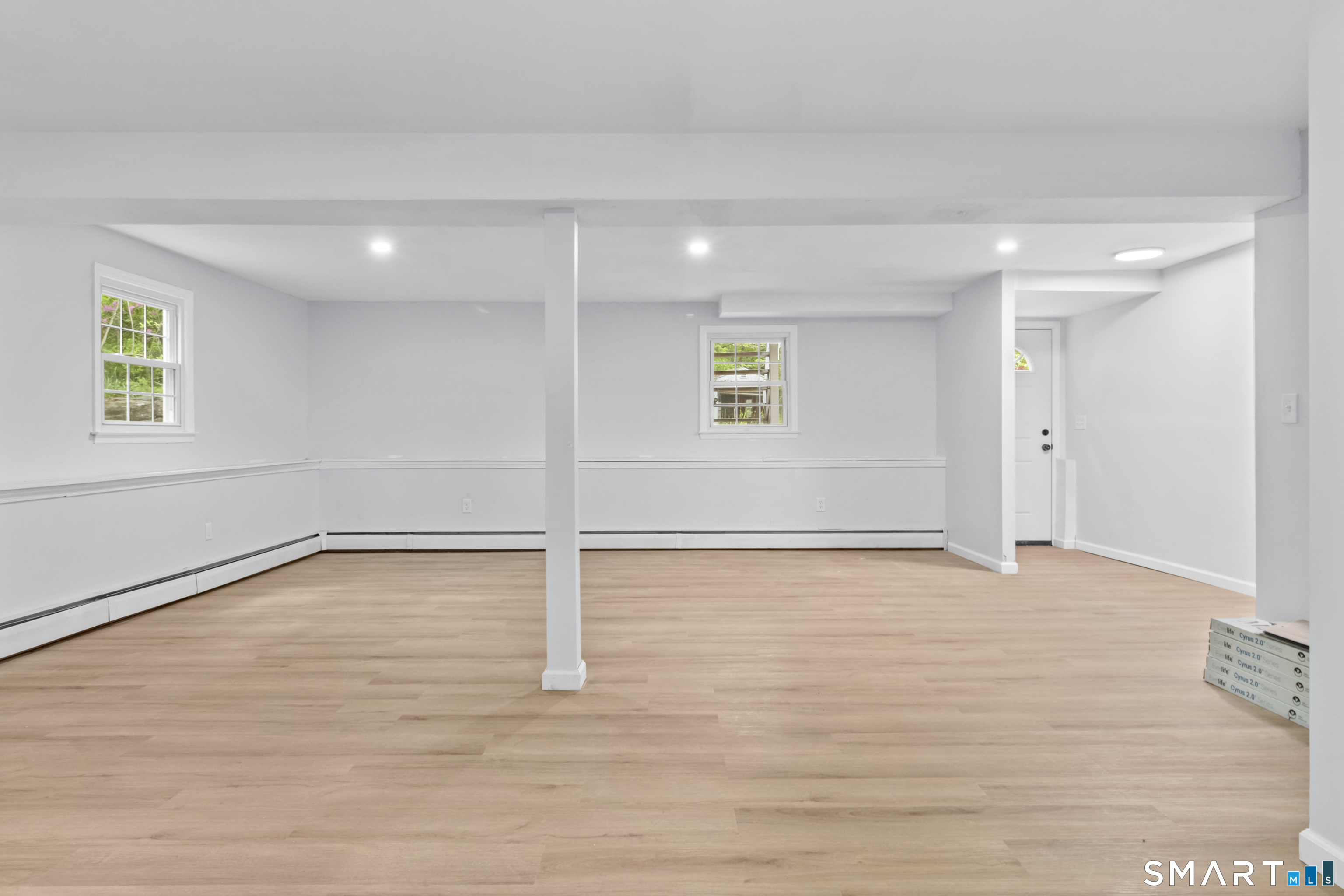 20 Quiet Woods Road East Hampton, CT 06424 - Photo 26 of 40 a view of an empty room with wooden floor and a window