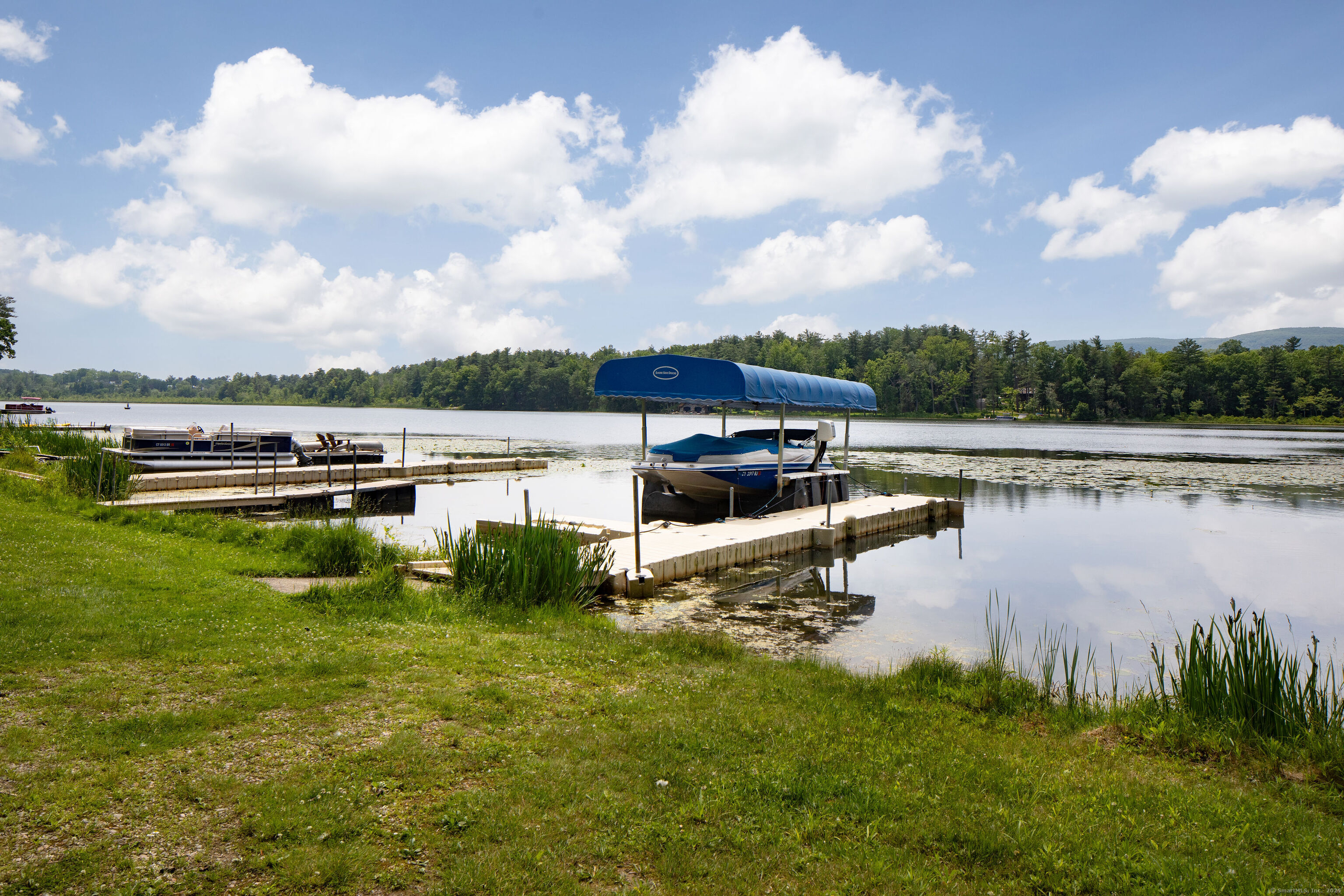 48 Preston Lane Salisbury, CT 06068 - Photo 1 of 36 a view of a lake with houses in the back
