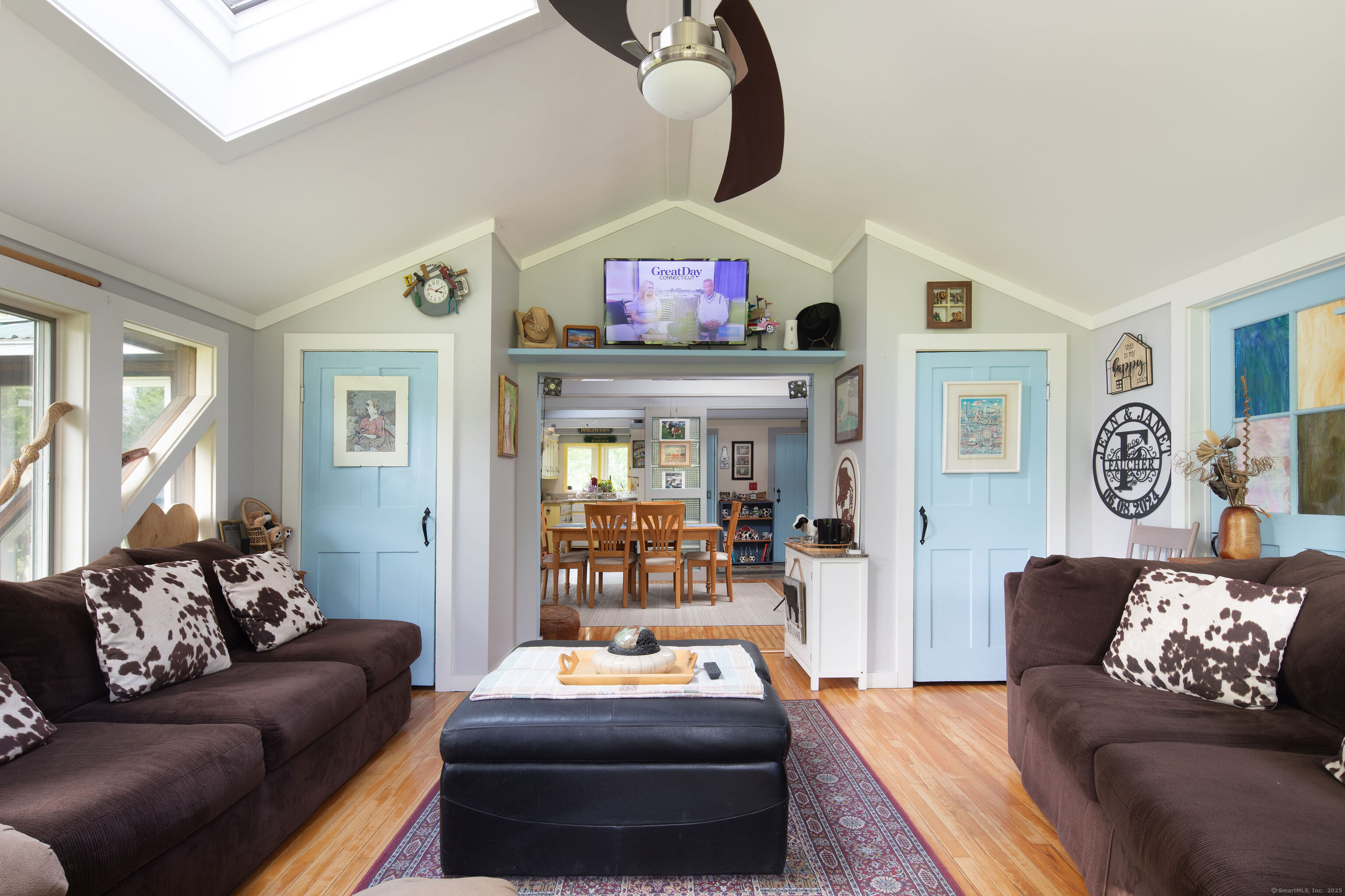 48 Preston Lane Salisbury, CT 06068 - Photo 21 of 36 a living room with furniture and a chandelier