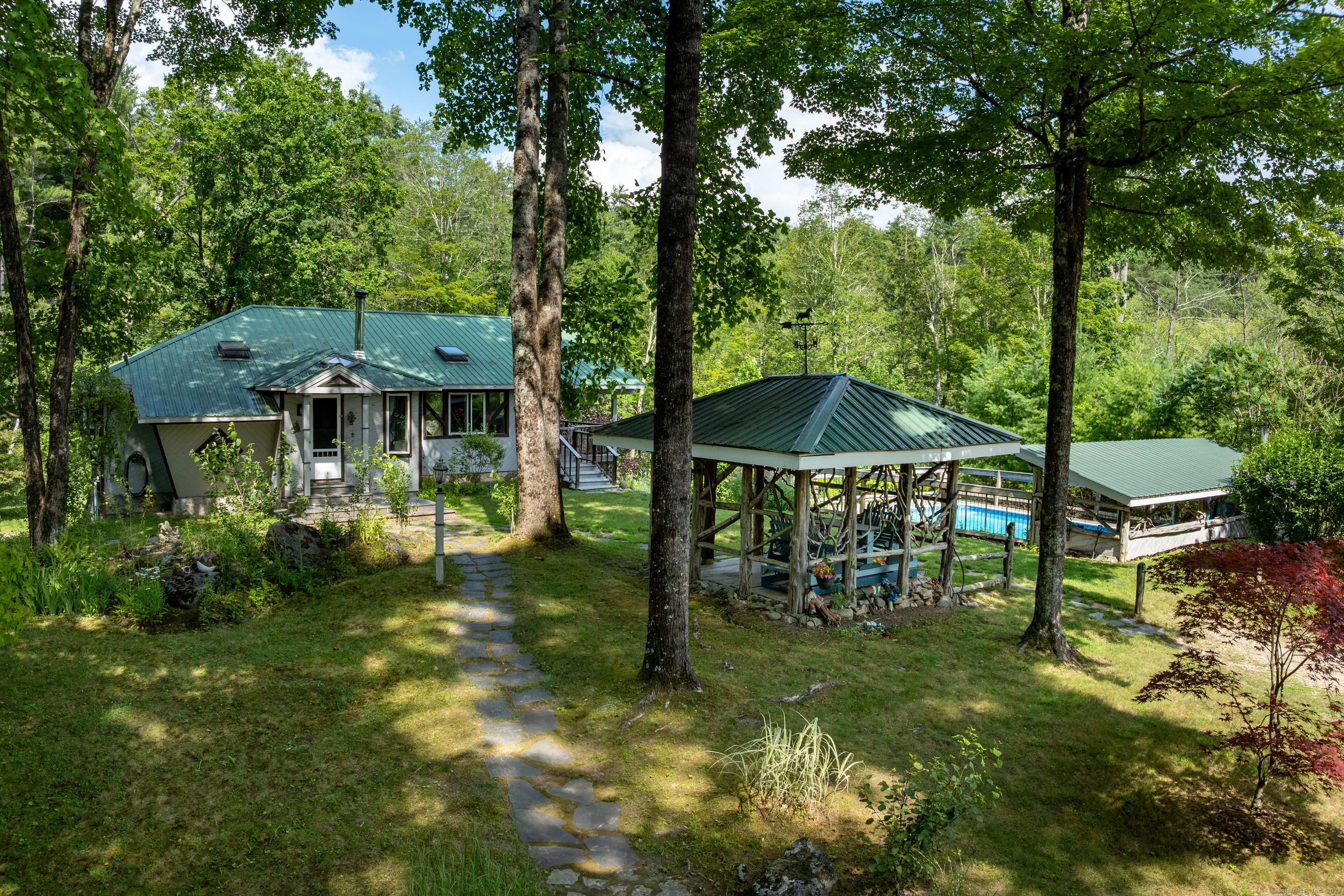 48 Preston Lane Salisbury, CT 06068 - Photo 6 of 36 a garden view with a seating space