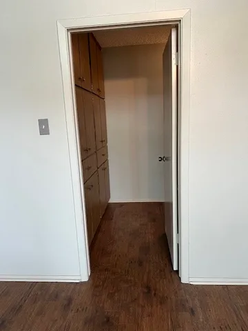 a kitchen with a stove sink and refrigerator