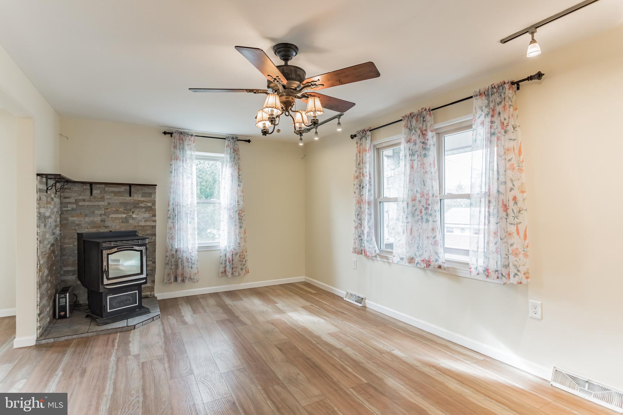 2629 Mill Road Boothwyn, PA 19061 - Photo 5 of 30 Living room-pellet stove