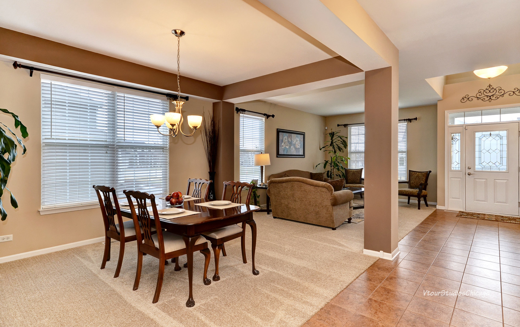 3006 Crossfire Trail Elgin, IL 60124 - Photo 8 of 35 a view of a dining room with furniture and wooden floor