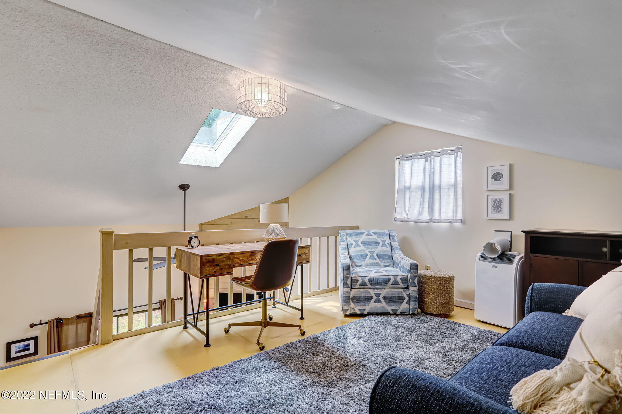 1756 Riley Street Jacksonville Beach, FL 32250 - Photo 33 of 44 a living room with furniture and wooden floor