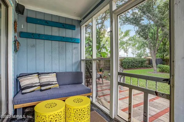 a building view with a outdoor seating space