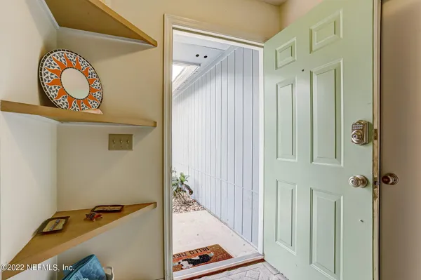 a view of a hallway with elevator