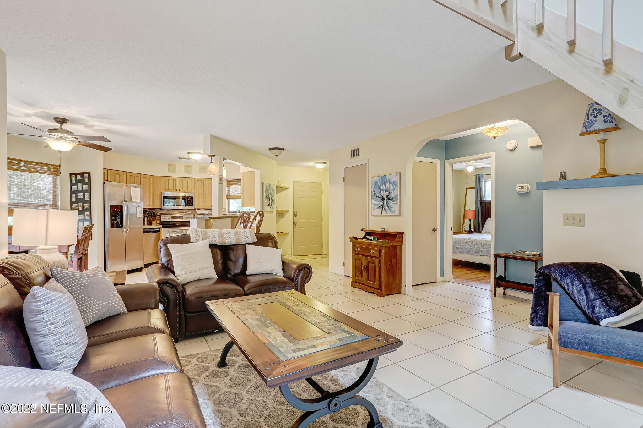 1756 Riley Street Jacksonville Beach, FL 32250 - Photo 10 of 44 a living room with furniture kitchen view and a table