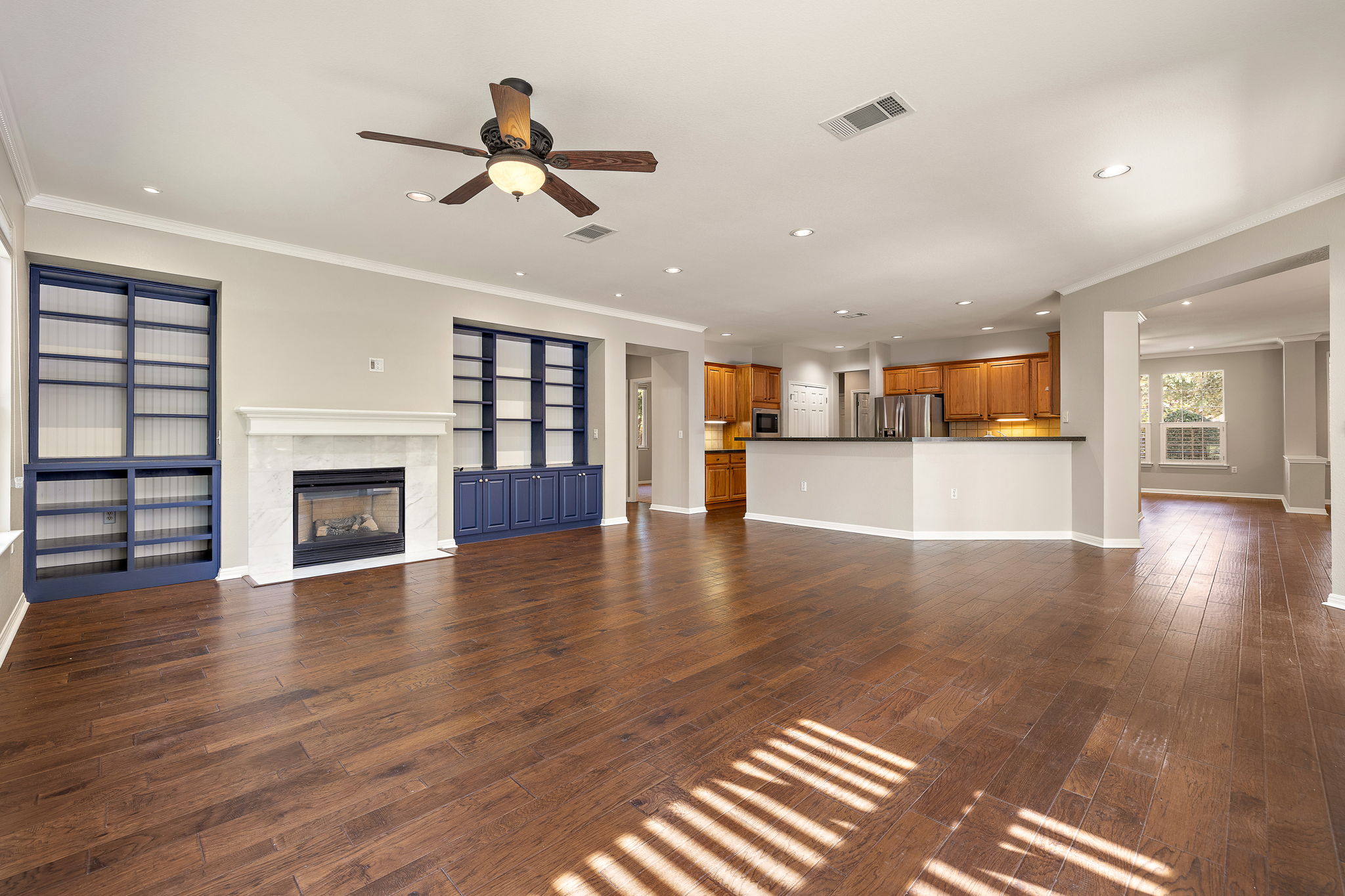 105 Liatris Lane Georgetown, TX 78633 - Photo 13 of 36 Living room open to kitchen