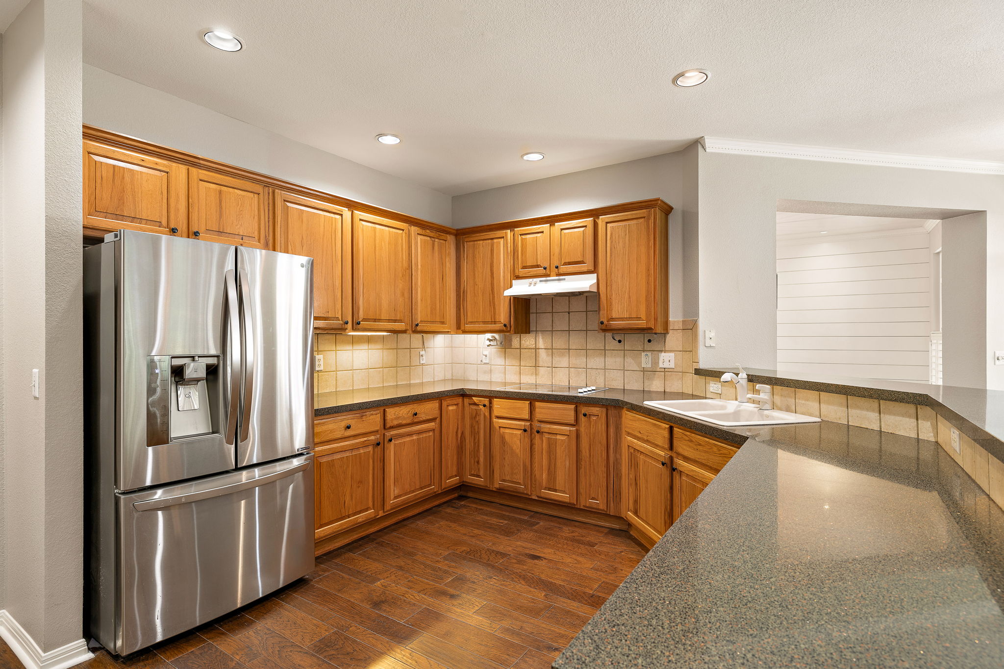 105 Liatris Lane Georgetown, TX 78633 - Photo 17 of 36 Quartz counter tops, stainless refrigerator