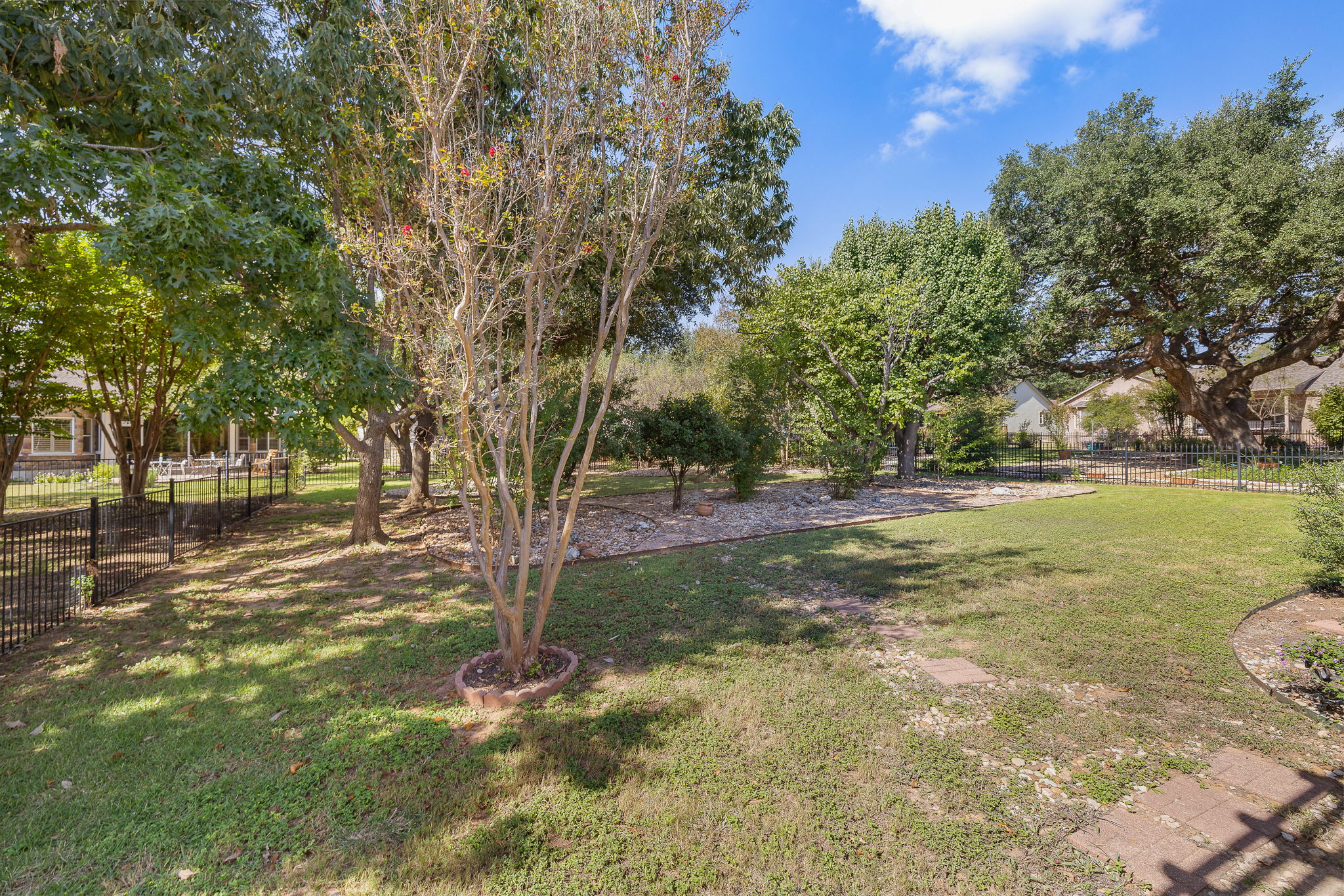 105 Liatris Lane Georgetown, TX 78633 - Photo 32 of 36 A rare yard in Sun City that is fenced and deep with trees that provide privacy