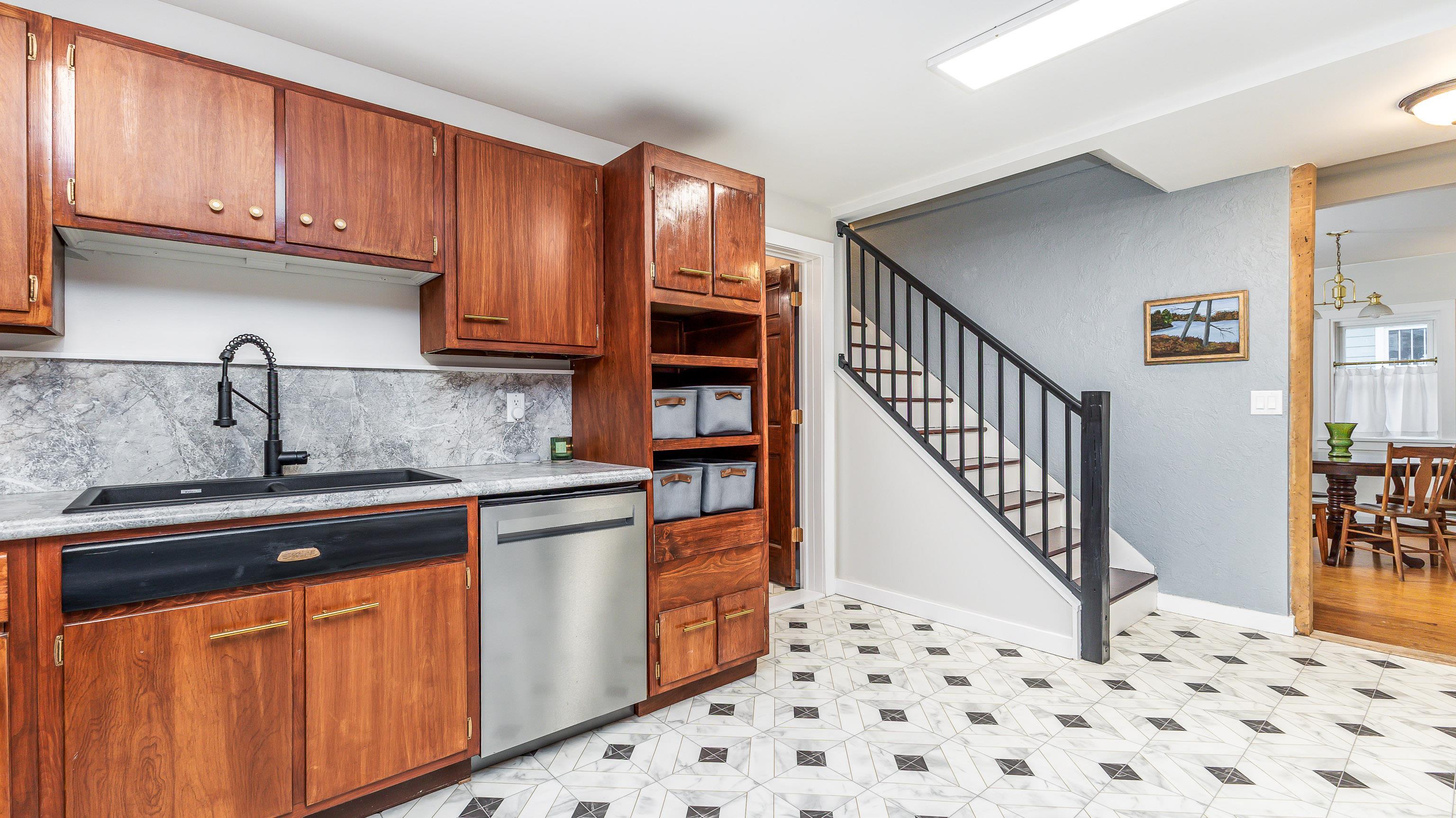 803 Ridge Street Galena, IL 61036 - Photo 15 of 40 a kitchen with stainless steel appliances granite countertop a sink and cabinets