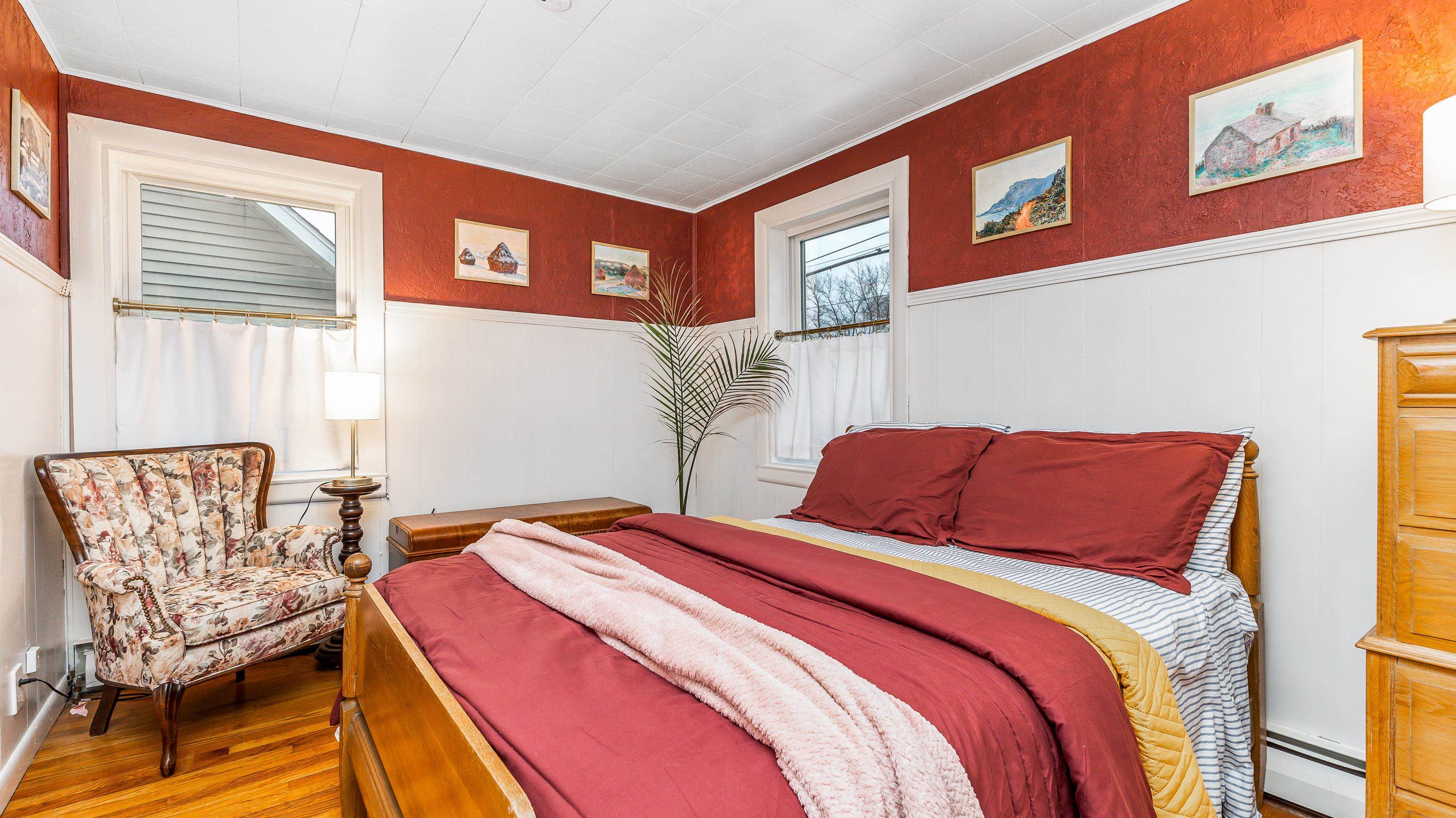 803 Ridge Street Galena, IL 61036 - Photo 18 of 40 a bedroom with a bed and wooden floor