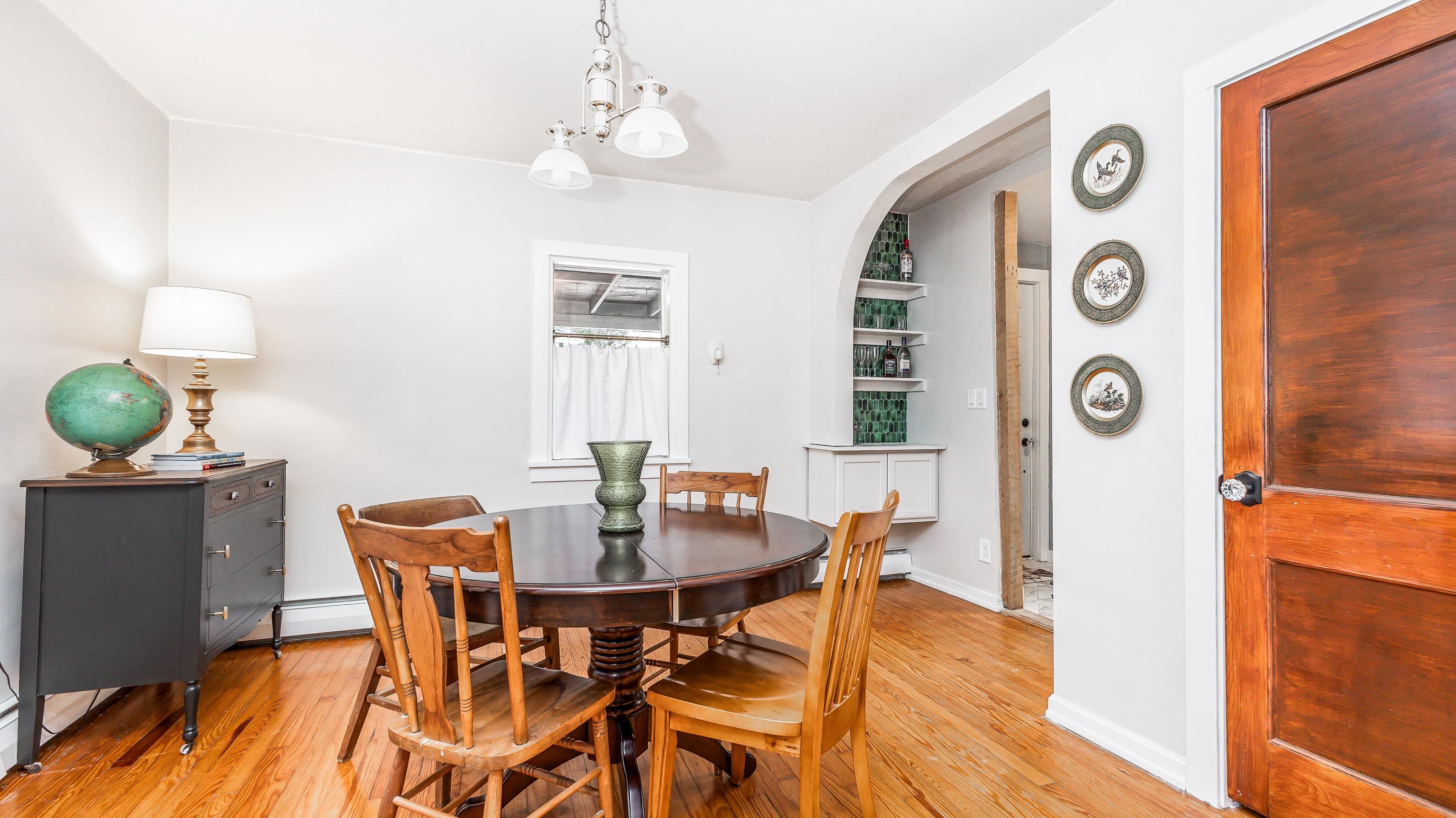 803 Ridge Street Galena, IL 61036 - Photo 19 of 40 a view of a dining room with furniture and wooden floor