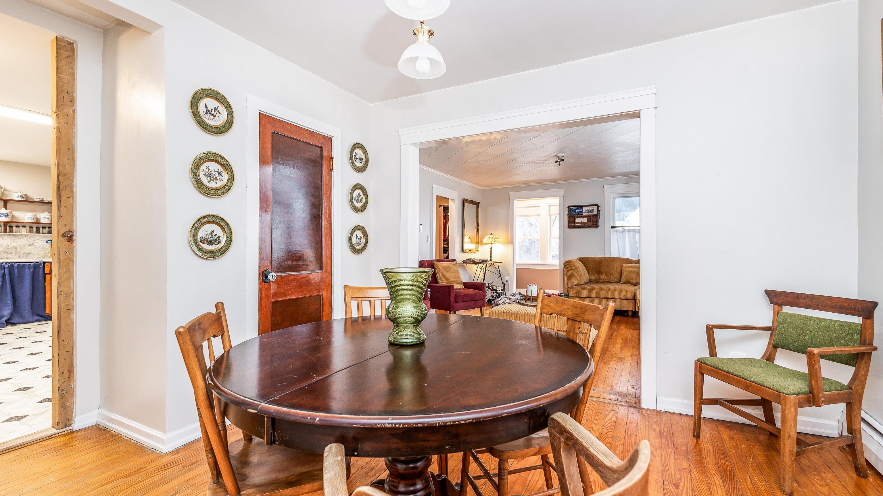 803 Ridge Street Galena, IL 61036 - Photo 20 of 40 a dining room with a dining table and chairs