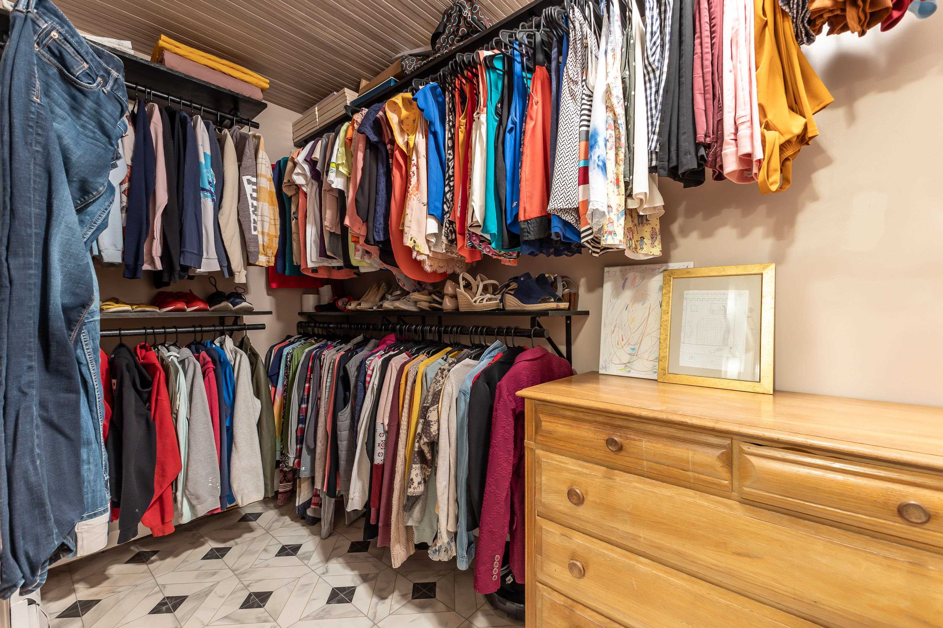 803 Ridge Street Galena, IL 61036 - Photo 30 of 40 a view of walk in closet with clothes and shoes