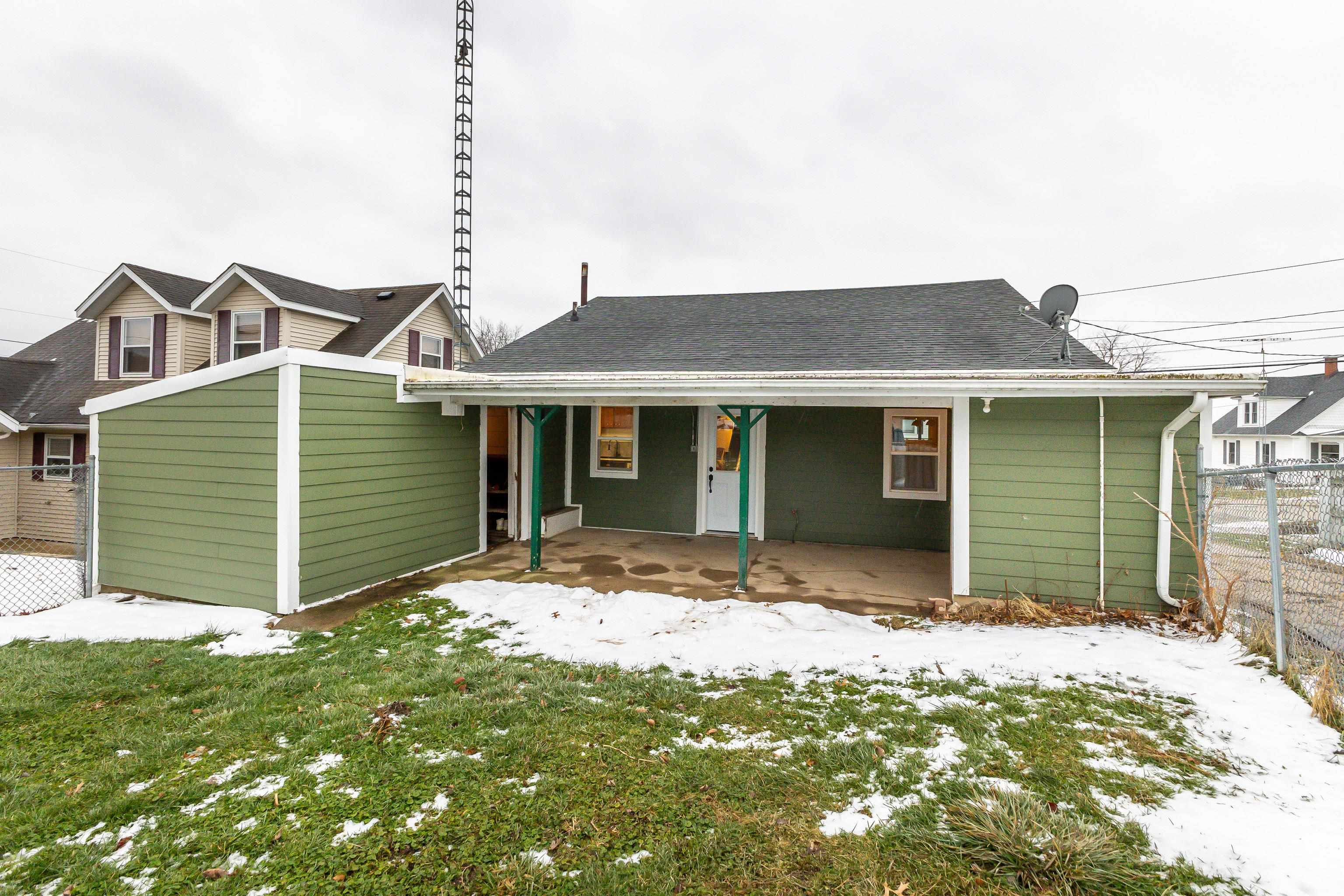 803 Ridge Street Galena, IL 61036 - Photo 39 of 40 a front view of a house with a garden and yard