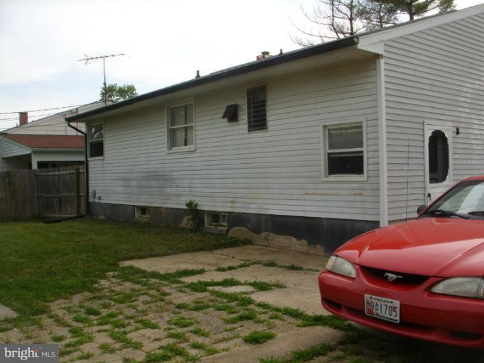 3139 Jeffland Road Windsor Mill, MD 21244 - Photo 2 of 11 a front view of a house with a yard