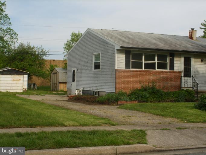 3139 Jeffland Road Windsor Mill, MD 21244 - Photo 3 of 11 a front view of a house with a yard