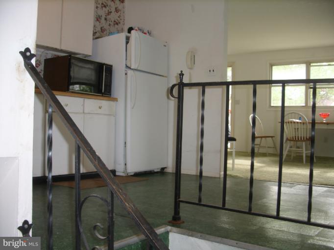 3139 Jeffland Road Windsor Mill, MD 21244 - Photo 7 of 11 a view of a utility room with staircase