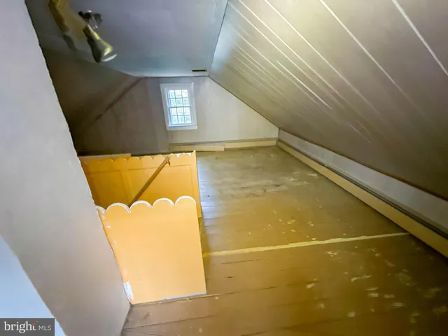 a view of a green field with lots of bushes