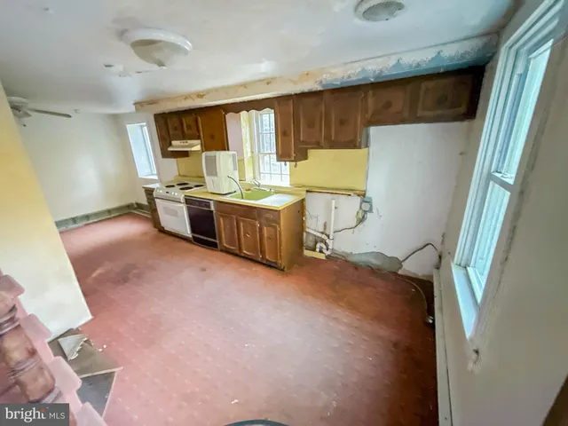 a room with furniture and a window