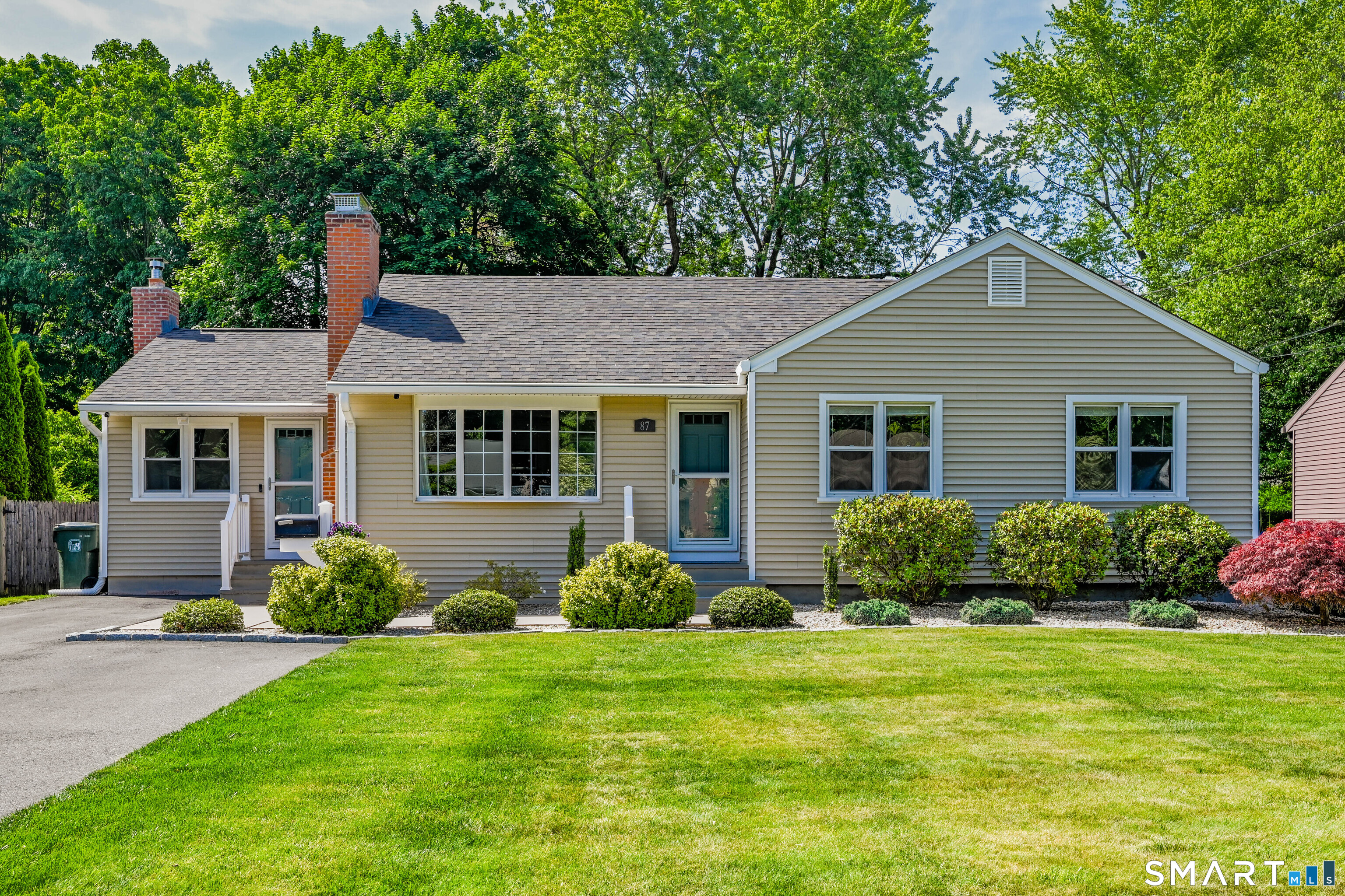 87 Lydall Road Newington, CT 06111 - Photo 35 of 35 a front view of a house with garden and porch