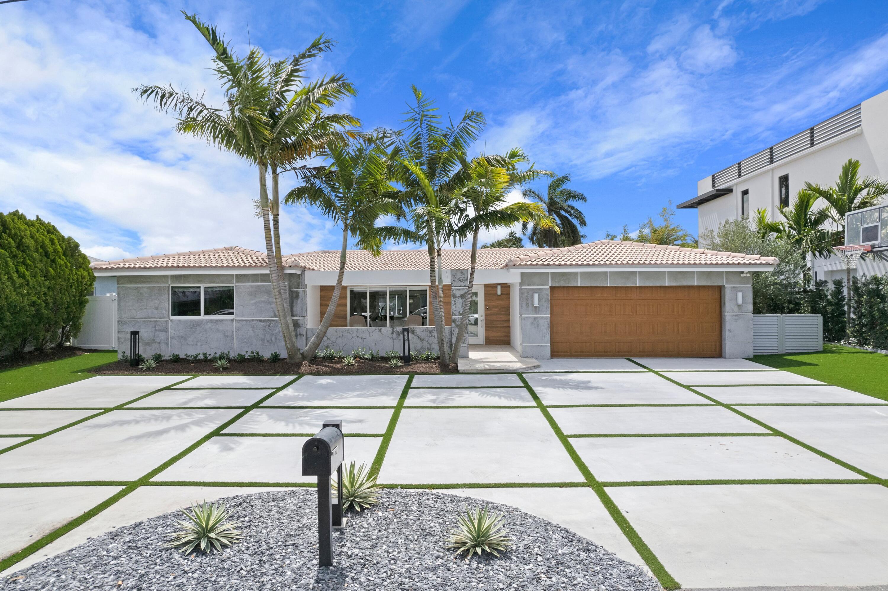 398 Southwest 13th Place Boca Raton, FL 33432 - Photo 1 of 36 a view of front a house with a yard